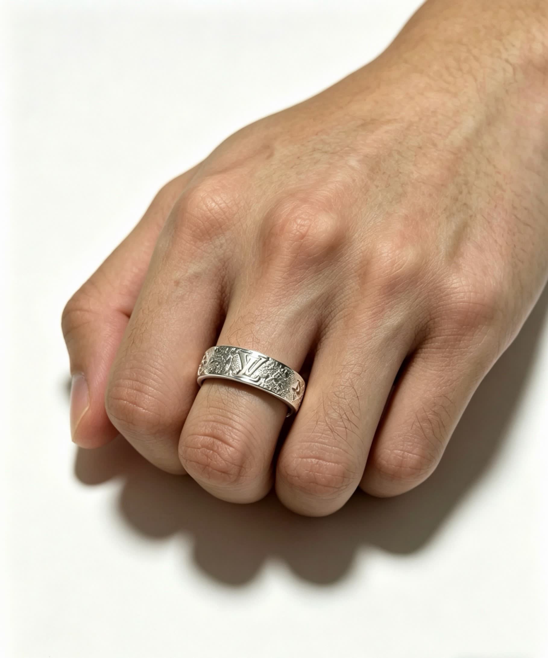 Louis Vuitton Silver Ring with Diamond Accents